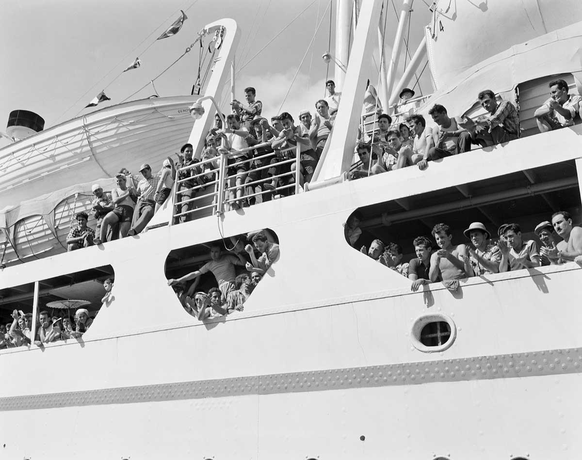 Young men arrive in Australia aboard a ship.