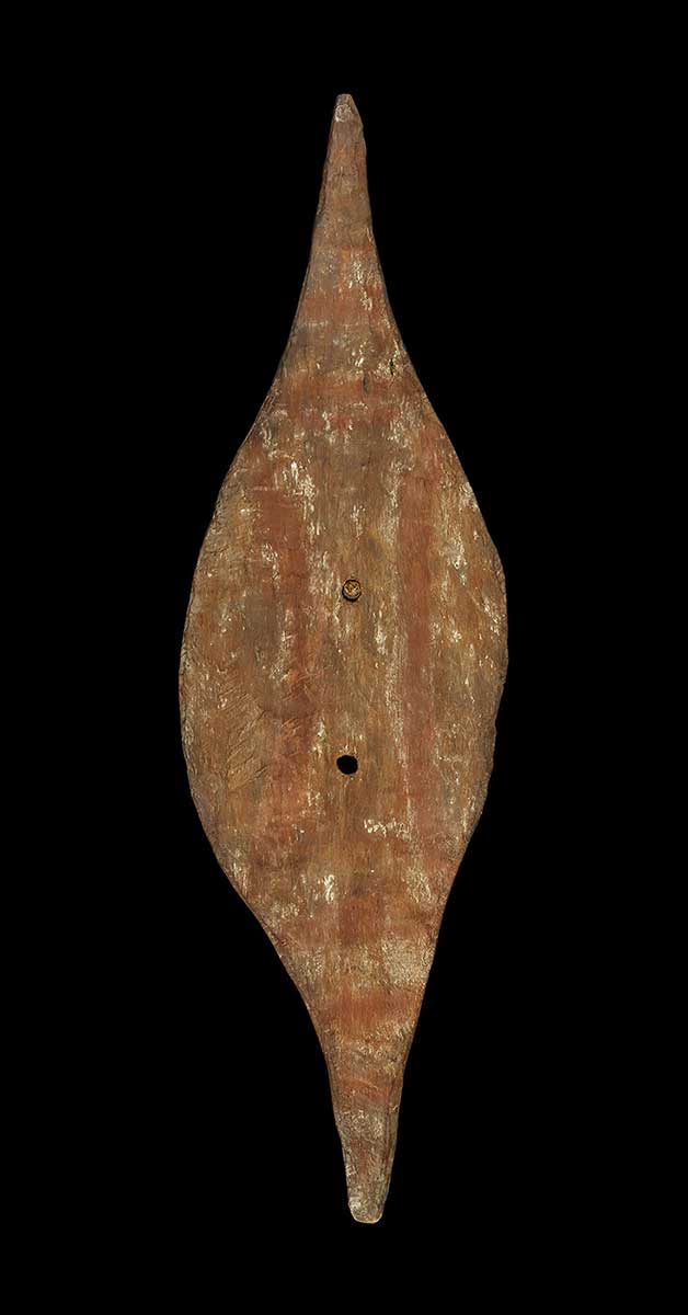 Shield, made of wood, decorated with red and white pigment. - click to view larger image
