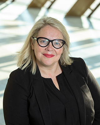 A portrait photo of Adrienne Erickson, 2019 Swayn Fellowship in Australian Design fellow.
