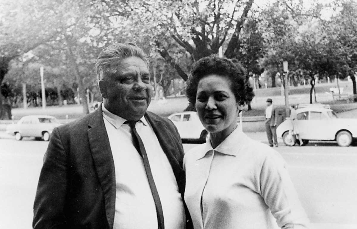 Black and white portrait photo of a First Australian man and woman. - click to view larger image