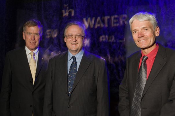 Daniel Gilbert and Alan Draeger standing in front of the fog screen at the entry to the Water exhibition. - click to view larger image