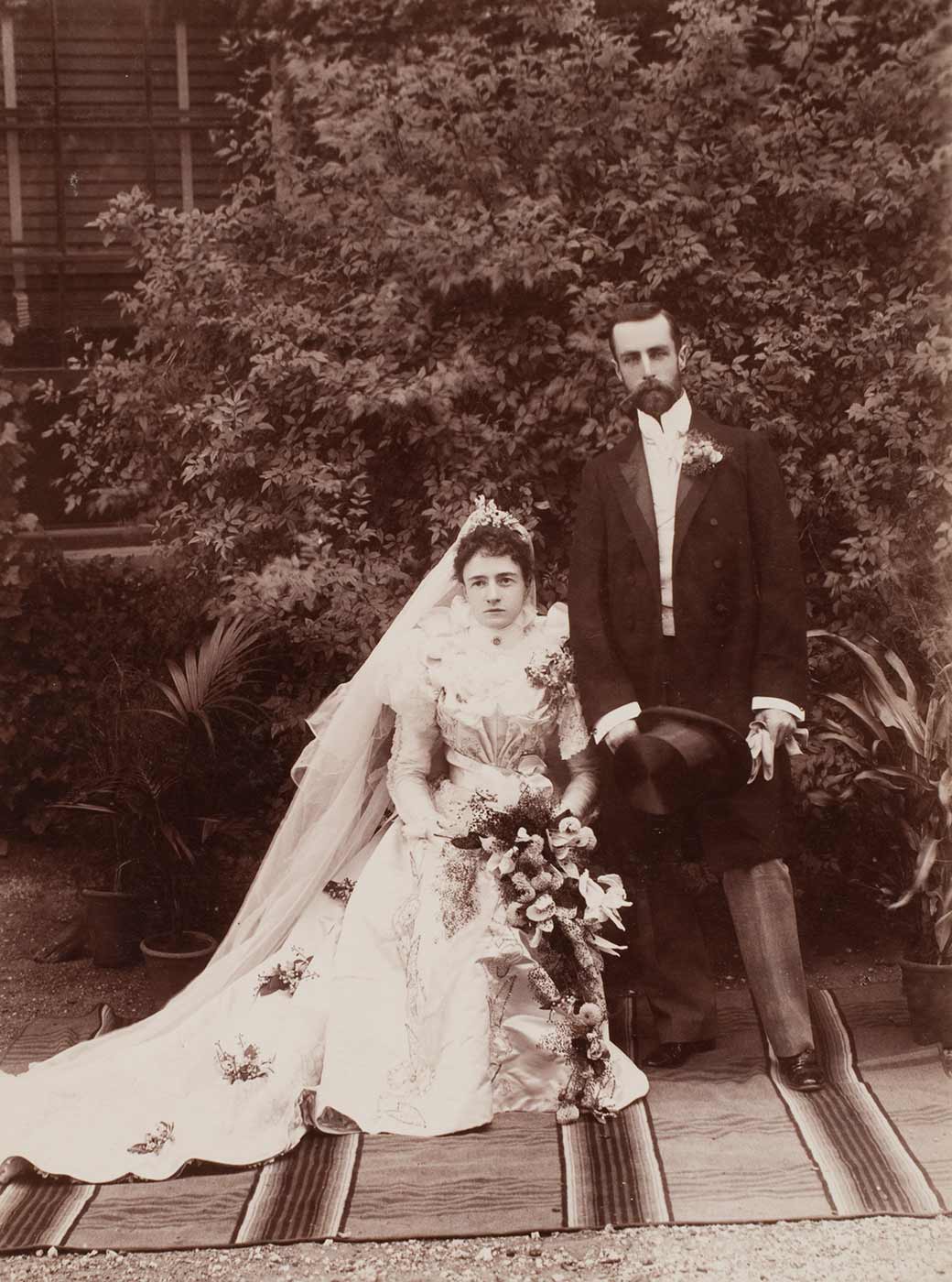 A black and white photo of Lilian Faithfull and William Hugh Anderson at Springfield homestead on their wedding day. - click to view larger image