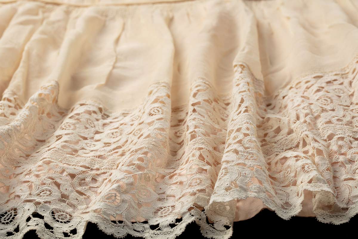 Detail of a lace garment. - click to view larger image