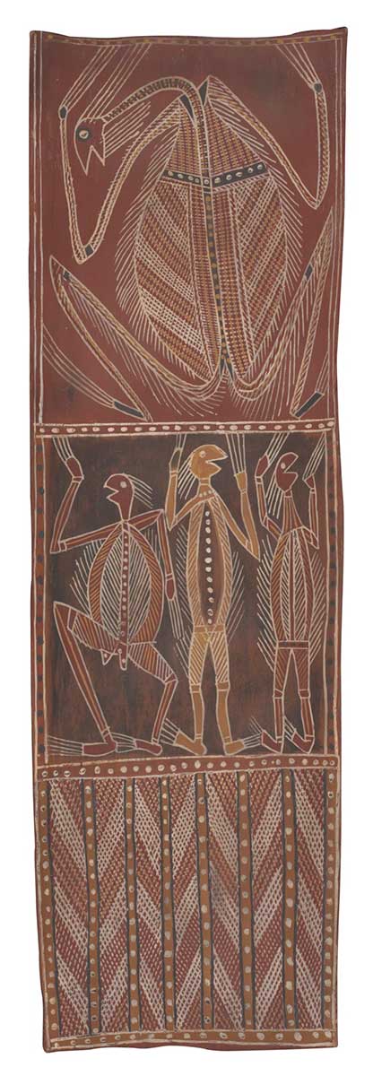 A bark painting worked with ochres on bark. The painting is divided into three panels with the top panel depicting a crouching spirit figure with a round body, long neck, long digits and hair and a cross-hatched body. The central panel three spirit figures, the outer ones painted in red and teh central one in yellow. The lowest panel has vertical red stripes outlined in black and containing yellow dots. Between these are diagonal stripes of red and white crosshatching. - click to view larger image