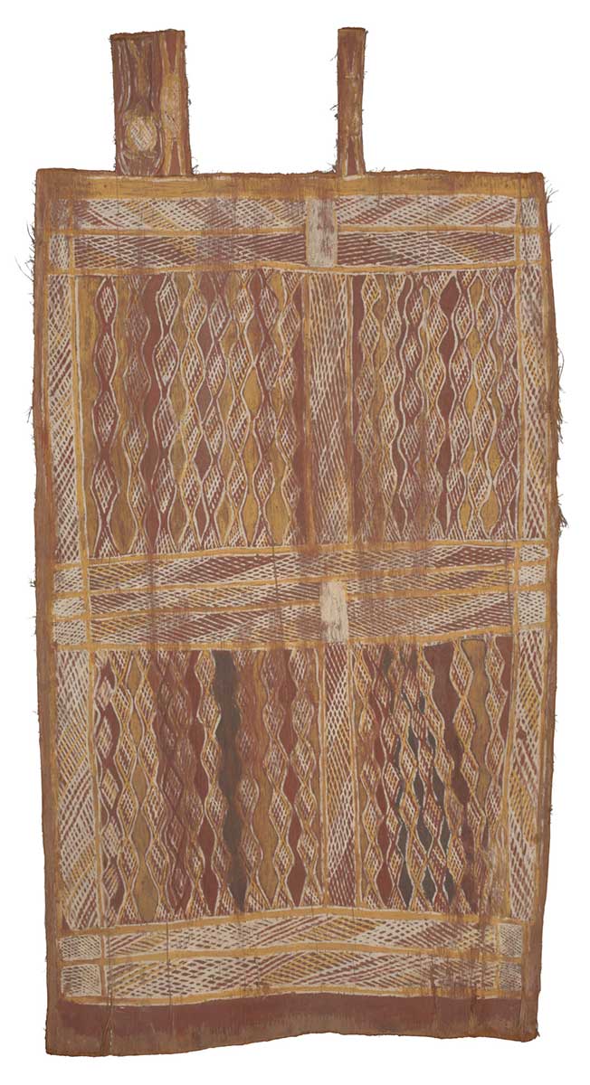 A bark painting worked with ochres on bark. It has two thin rectangles protruding from the top of the main panel. Each depicts an insect-like figure, with the one on the left also depicting a turtle and a fish. The main panel is divided into four further sections by wide crosshatched bands. There are diamond-shaped patterns painted in different colours running vertically down each of these. - click to view larger image