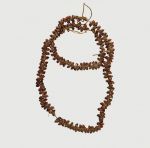 Necklace consisting of small brown snail shells arranged on a string.