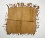 Hand-woven cloak made of flax with a fringed edge.