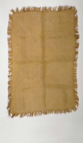 A piece of very fine matting with a fringed border made of light brown plantain leaf fibres.