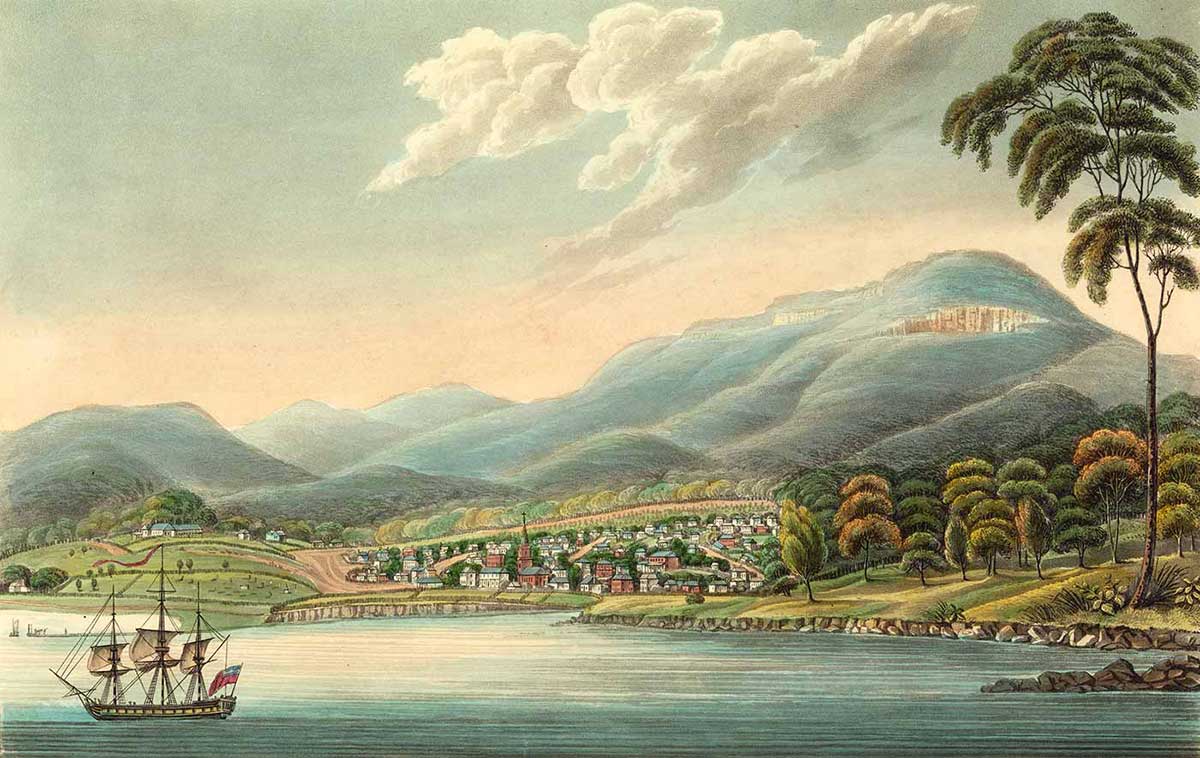 Engraving of a town on a harbour. A ship is visible in the foreground, with hills in the background. A small township comes down to the waterfront, surrounded by trees.
