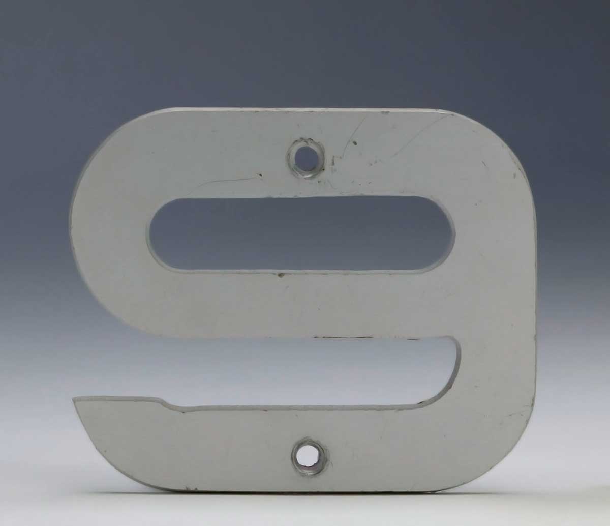 Number '9' with screw holes in top and bottom. - click to view larger image