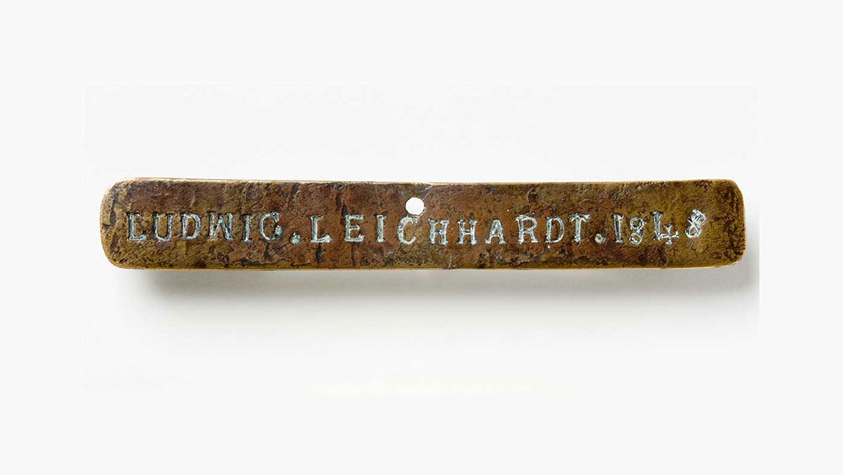 A brass nameplate engraved with the name ‘Ludwig Leichhardt’ in capital letters and the year 1848. - click to view larger image