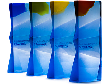 A graphic depicting four glass trophies