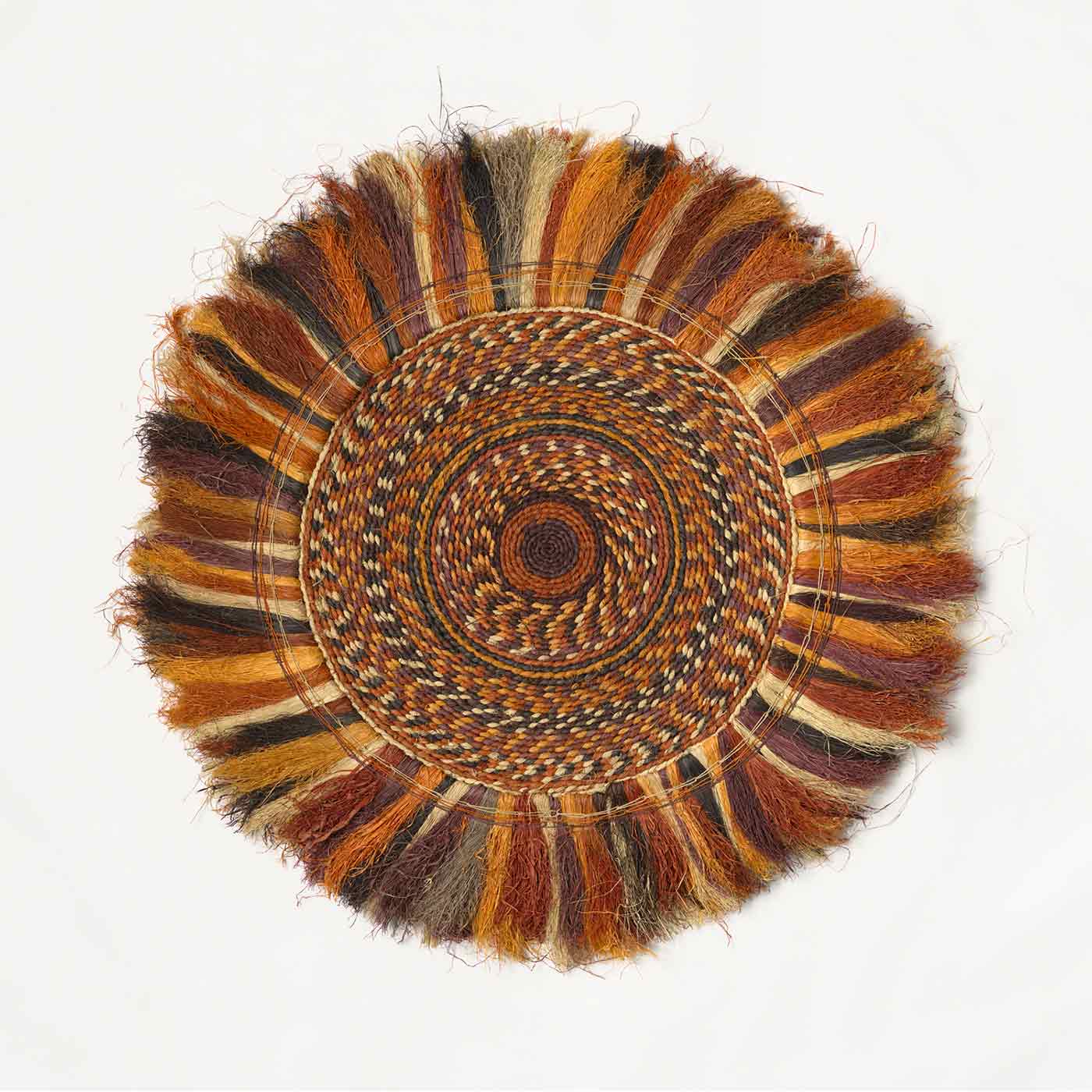 A circular weaving resembling the sun - click to view larger image