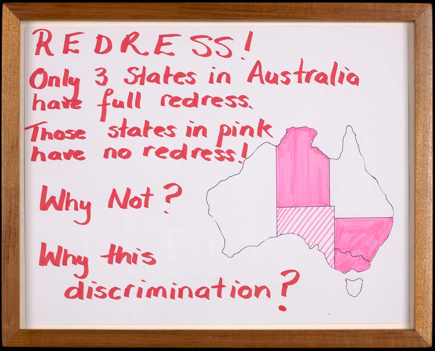 A hand-drawn map of Australia with the Northern Territory, New South Wales and Victoria coloured pink, and South Australia marked with diagonal pink lines. Written in red felt pen is 'REDRESS! / Only 3 States in Australia / have full redress. / Those states in pink / have no redress!/ Why Not? / Why this discrimination?'. - click to view larger image