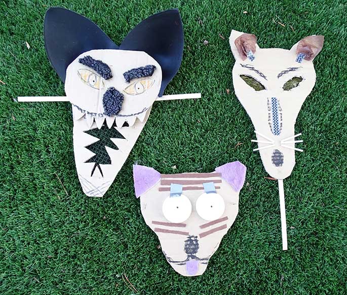 Three thylacine masks.