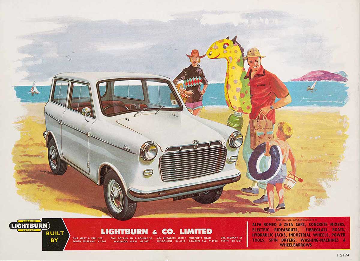 A coloured advertising brochure cover featuring a small white motor car, a woman, and man and child holding inflatable toys in a beach setting.