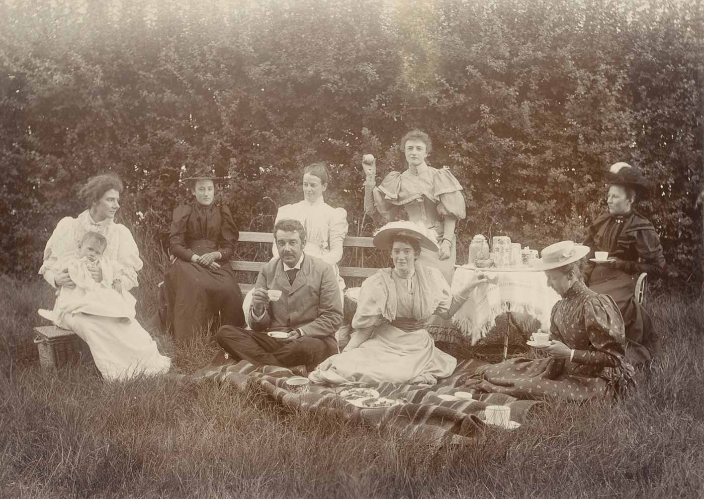 Faithfull family members and friends having a picnic in the garden at Springfield. - click to view larger image
