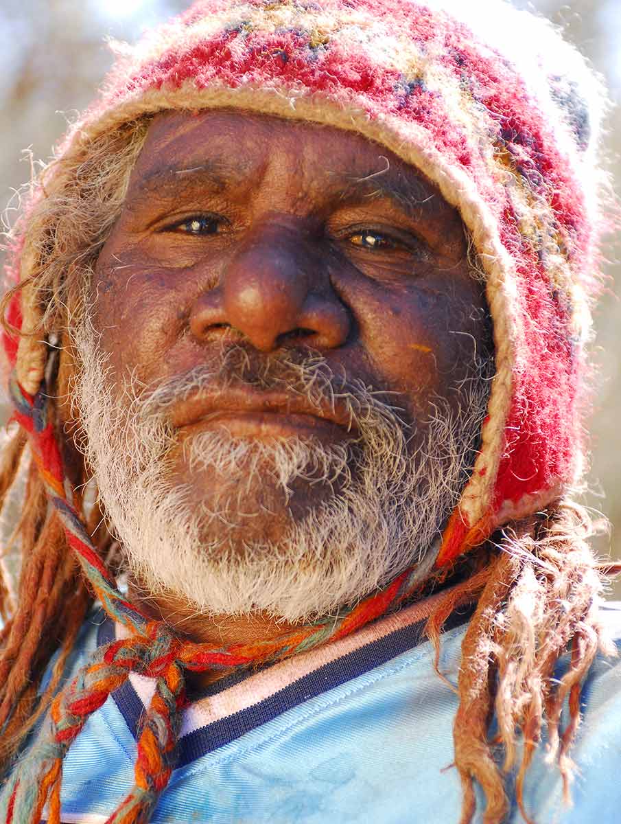 Portrait of Patrick Olodoodi (Alatuti) Tjungurrayi. - click to view larger image