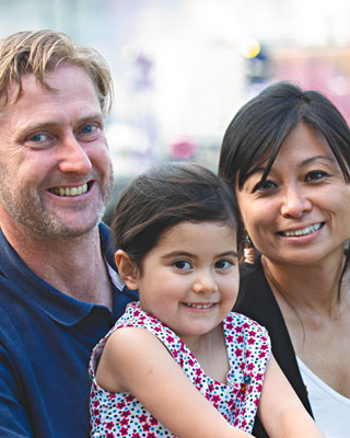 A man, woman and child.