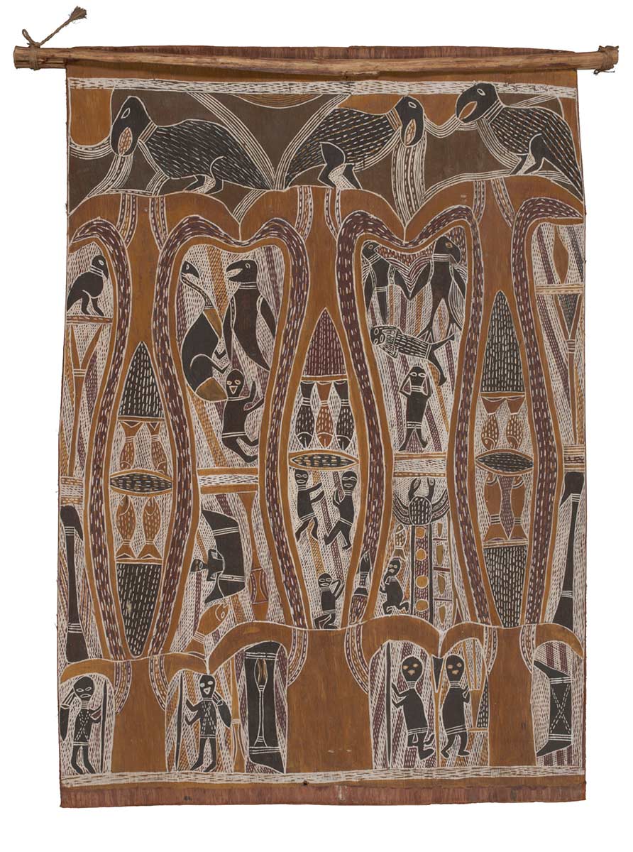A bark painting worked with ochres on bark and with a wooden restrainer at one end. At  the top of painting there are three black birds.  At the foot of the painting there are four crosshatched panels which depict from left to right, two women with dilly bags and digging sticks, a canoe, a man with a spear, a man weaving and another canoe. In the centre there are three pointed shapes in which there are depicted cooking fires and fish, with the centre one including three human figures. There are also two larger shapes, the left one contains two birds and a fish and two human figures, one in a canoe.  The shape on the right contains two birds, a fish, a crab and its tracks and three humans figures, one of whom is a child. - click to view larger image