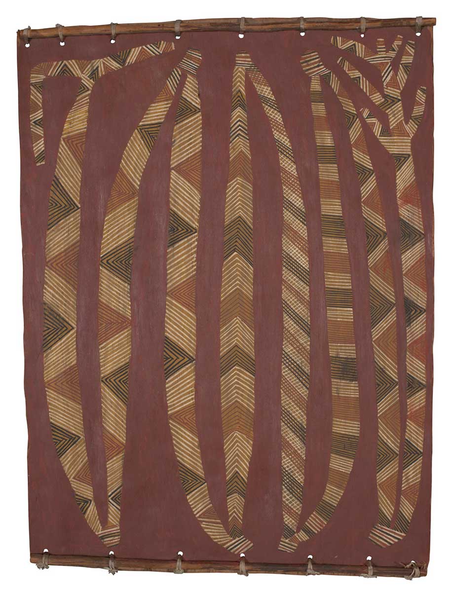 A bark painting worked with ochres on bark and on wooden restrainers. It depicts an elongated figure arranged in a zigzag position and painted in horizontal or diagonal stripes of black, white, green and  brown with some crosshatching in these colours. - click to view larger image