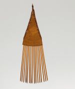 A comb made of sixteen small sticks held together by a weave of light brown fibres.