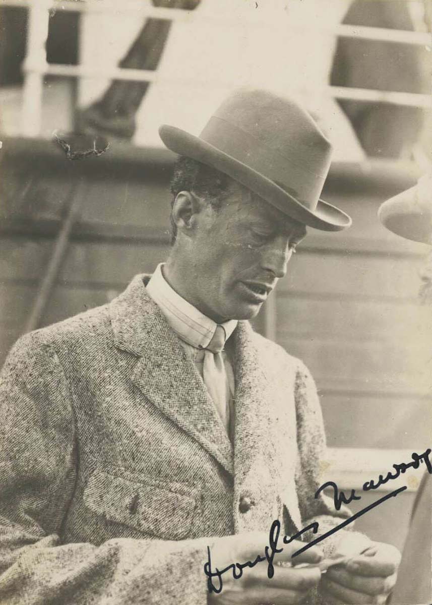 black and white photo of man in suit and hat - click to view larger image