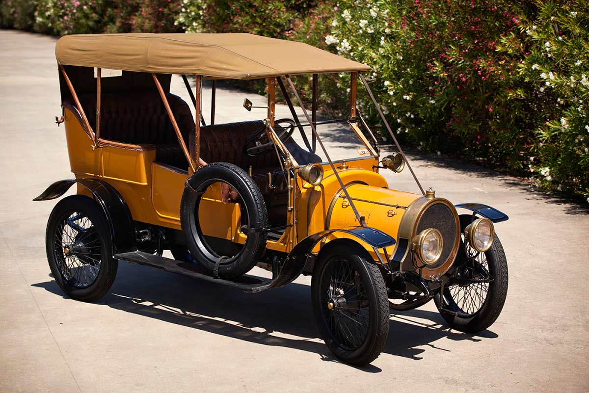 A 1913 Delaunay-Belleville Tourer. The yellow body is a replica, which was fitted in the 1960s, and it has black mudguards and running boards. The interior has been refurbished and it is upholstered in brown leather. The car has a 3.75 litre four-cylinder engine and a four speed gearbox. Engine number 5243V. Chassis number IA4. It is thought the original colour was most likely buff.
