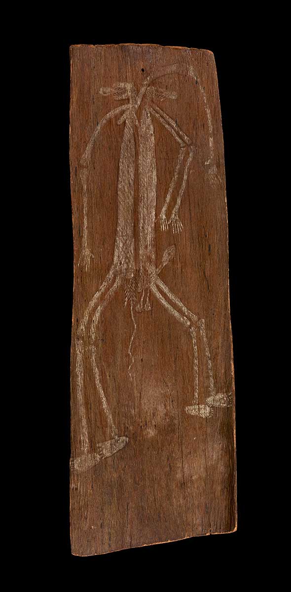 A bark painting of a human figure in white pigment on a dark background. - click to view larger image