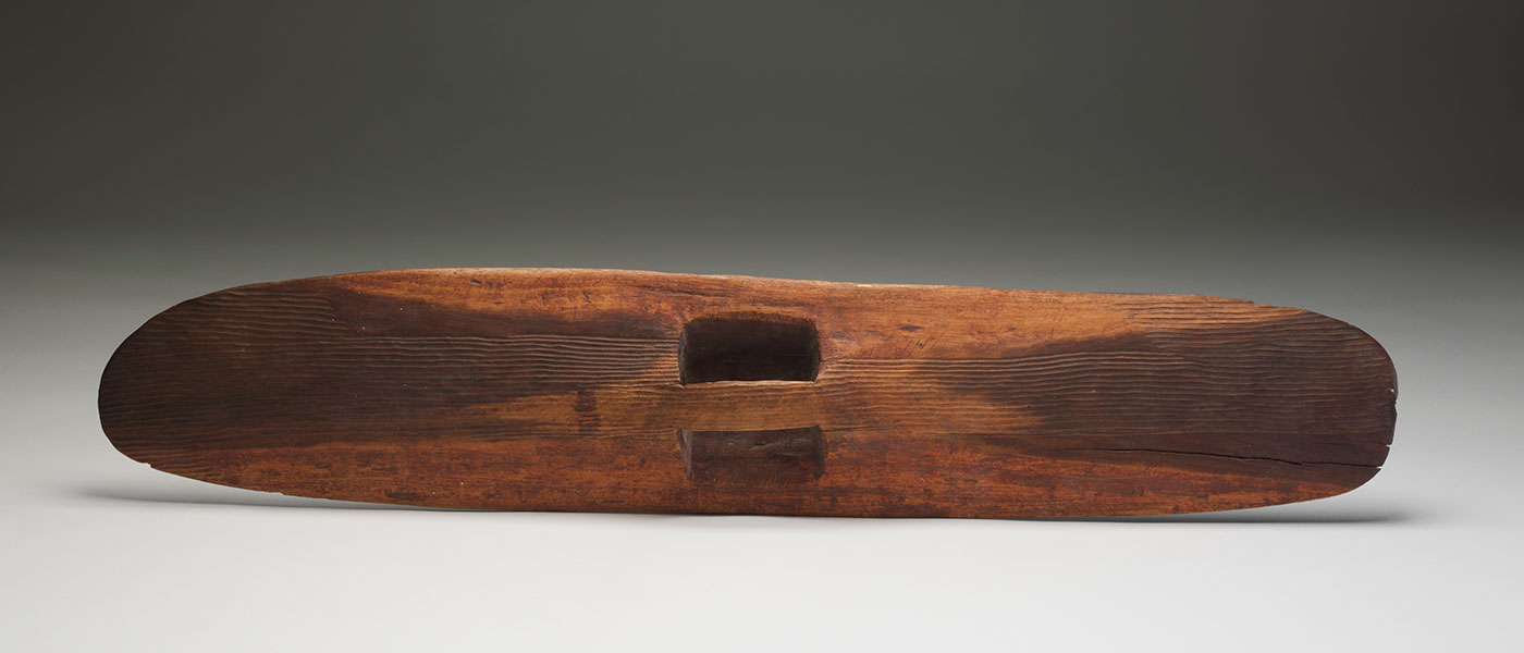Incised parrying shield 1978 made by Tim Payungka Tjapangarti. - click to view larger image