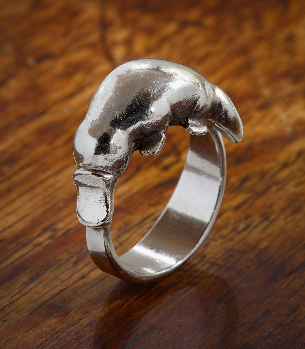 Silver ring featuring a platypus design. - click to view larger image