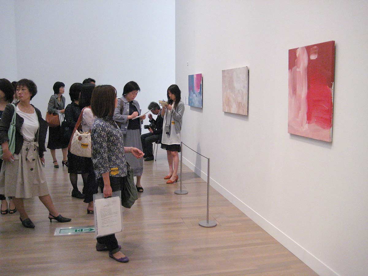 Japanese visitors viewing art work. - click to view larger image