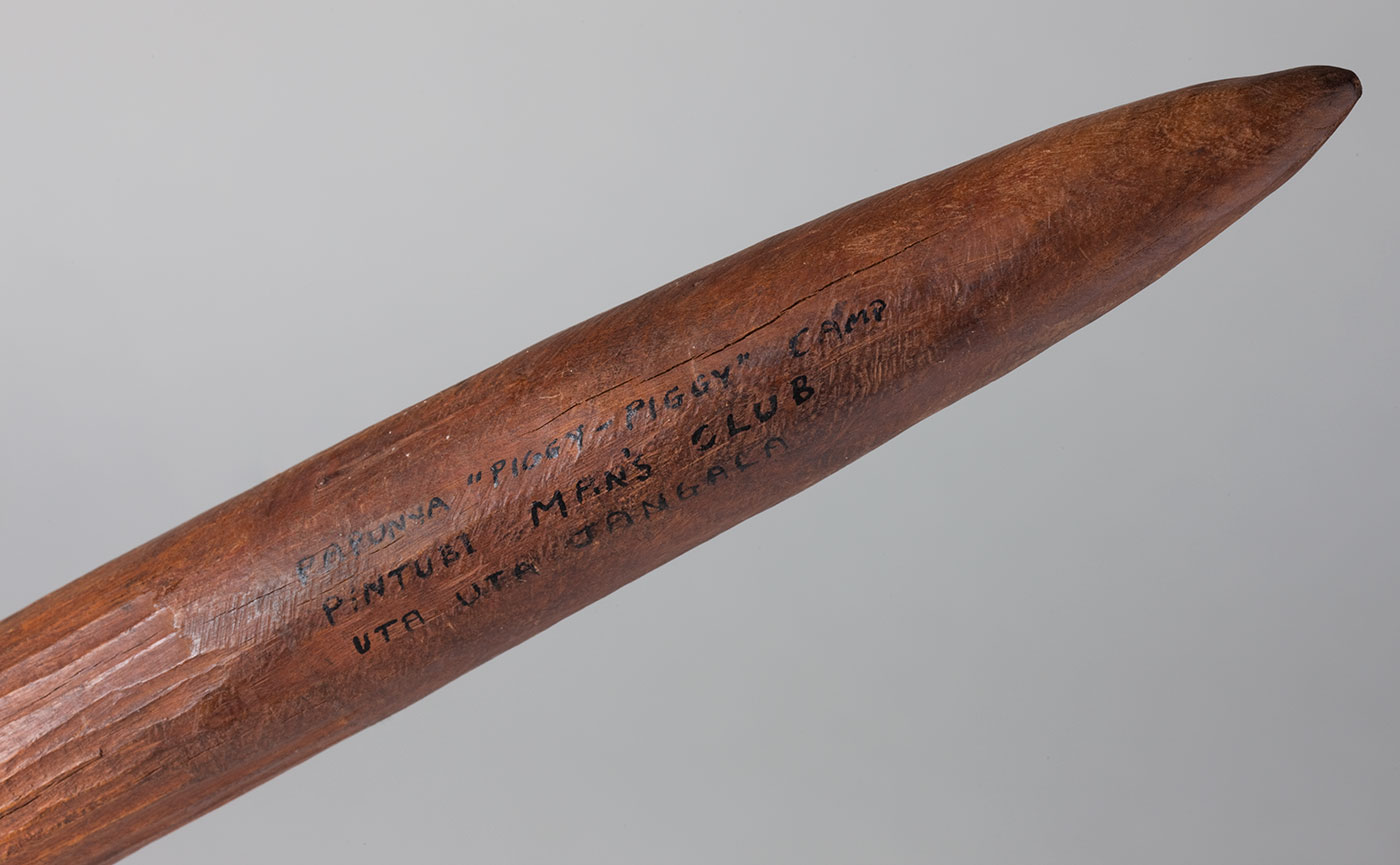 Wooden club with engraving. - click to view larger image