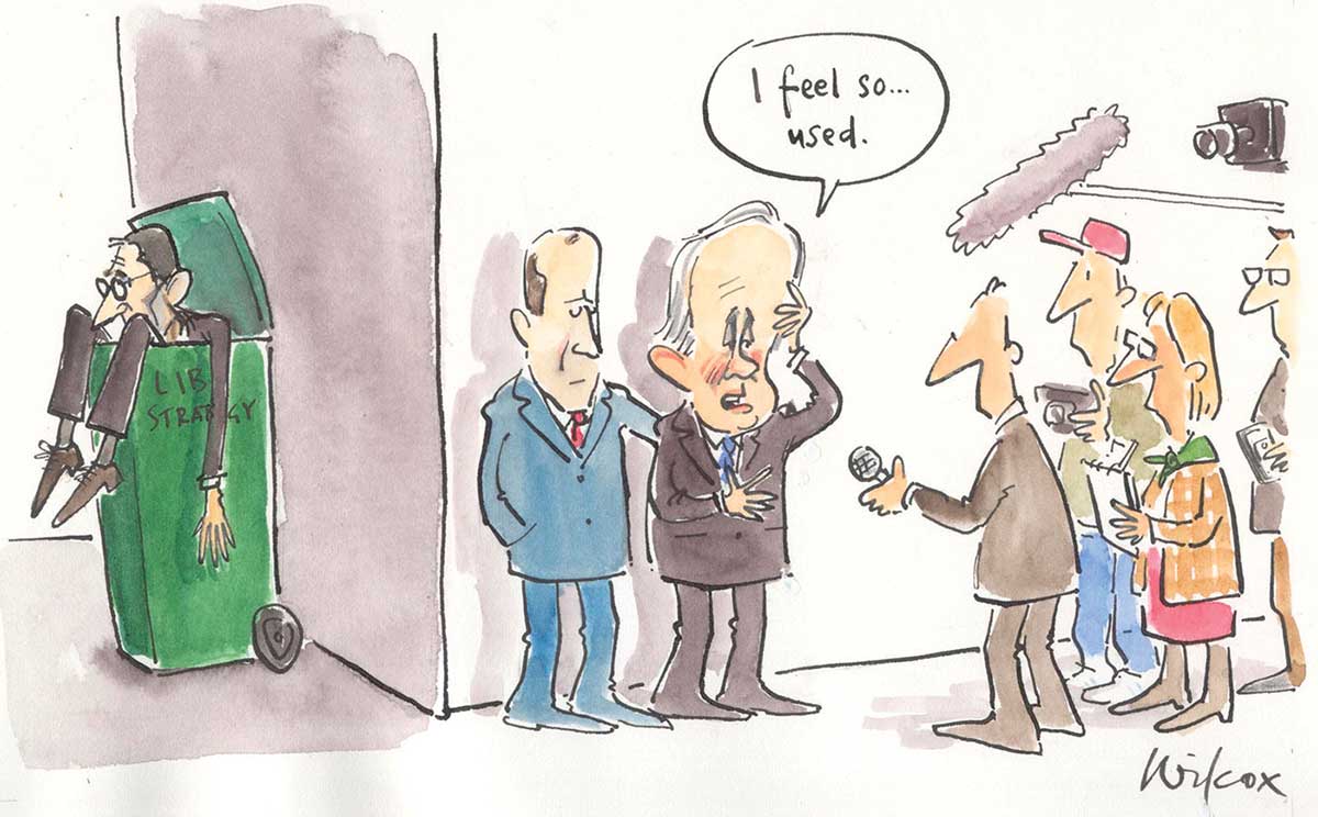 A colour cartoon of Malcolm Turnbull facing the press. In the background, Godwin Grech can be seen spilling out of a green wheelie bin, with the words 'Lib strategy' faintly visible on its side. Four journalists are in front of Mr Turnbull, microphones and cameras pointing. Mr Turnbull stands against a wall, with a man at his side with his arm behind Mr Turnbull offering support. With his hand at his brow as if massaging his temple to relieve a headache, Mr Turnbull says 'I feel so used'. - click to view larger image