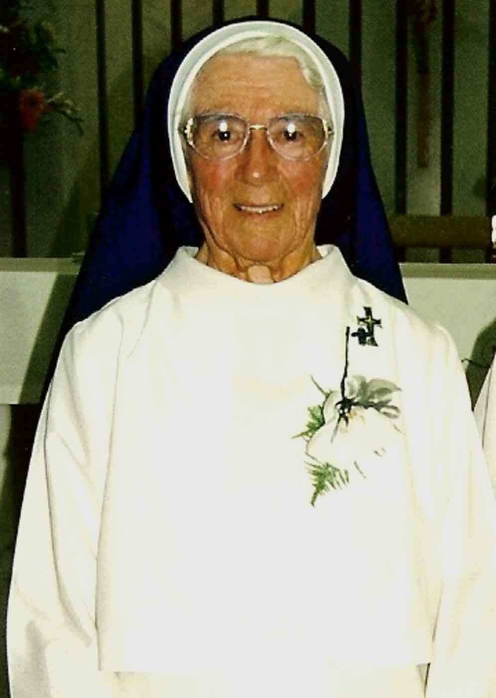 Photo portrait of a nun wearing habit. - click to view larger image