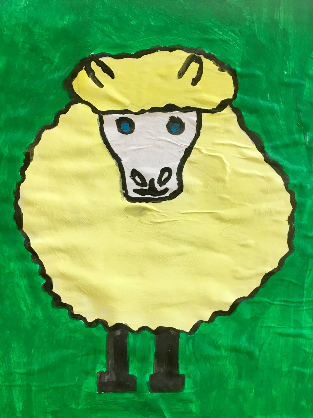 Illustration of a sheep on paper created with textas and paint.