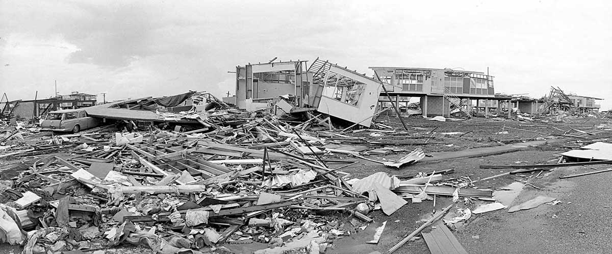 Black and white photograph of destroyed buildings.