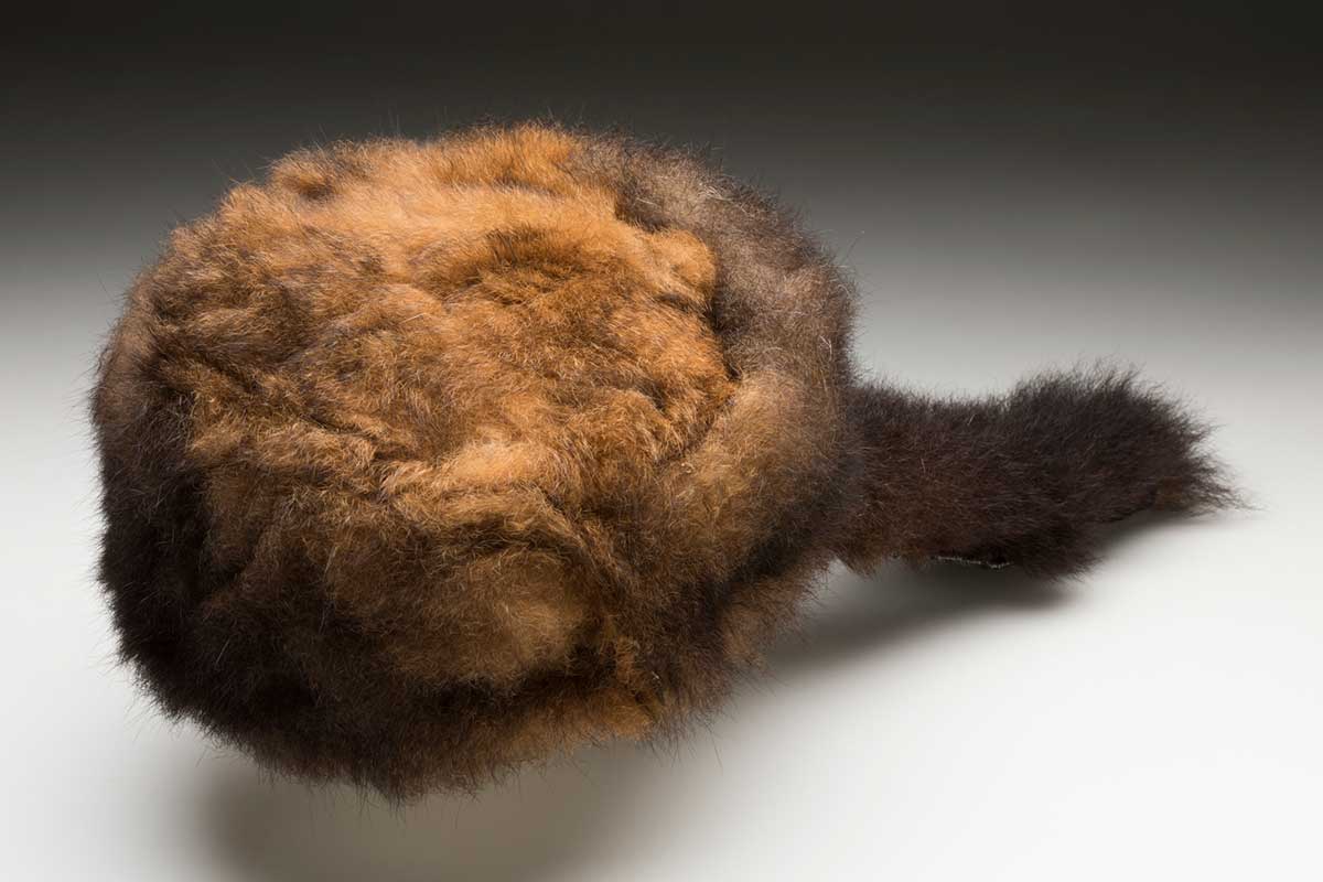 Cap with tail made from possum skin.