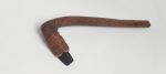 adzes, with a round handle and knee made of a light brown, lightweight wood with a four edged blade made of basalt, and firmly attached to the shaft with plaited coconut fibres