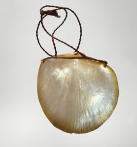 One piece of a two-piece neck ornament consisting of two mother-of-pearl mussel shells. Each with its own neckband.