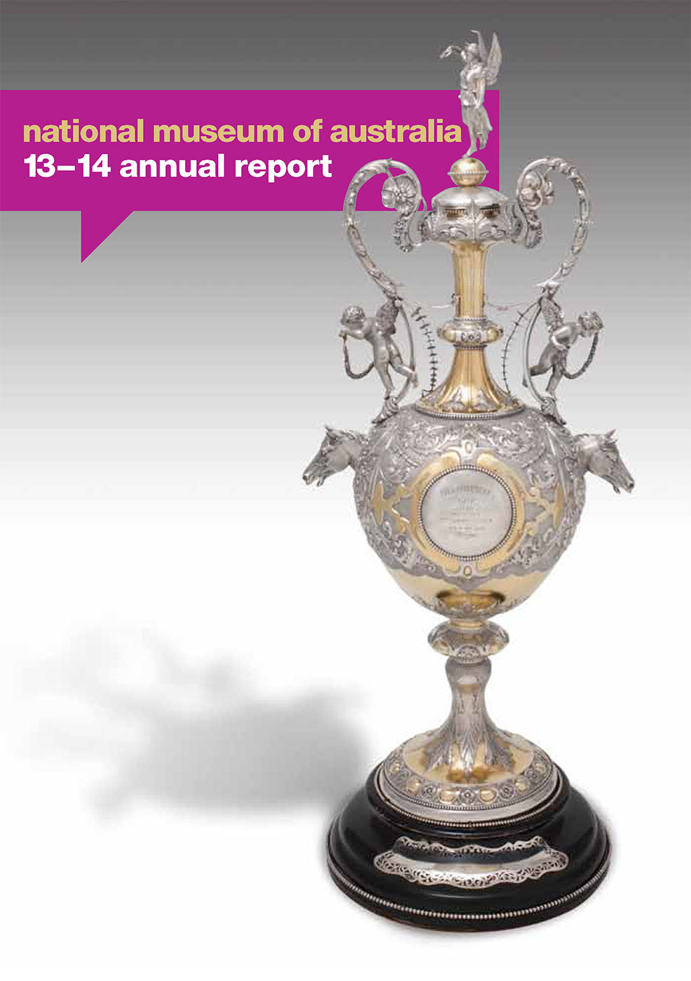 Annual Report 2013-2014 cover which includes a photograph: The earliest intact Melbourne Cup, won by racehorse The Barb, trained by John Tait, in 1866.