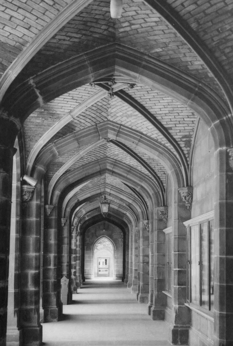 photo taken at one end of an empty cloister - click to view larger image