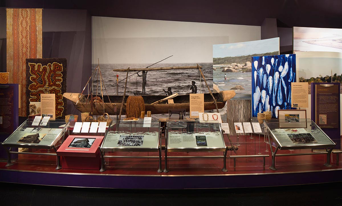 Museum display of various images and objects.