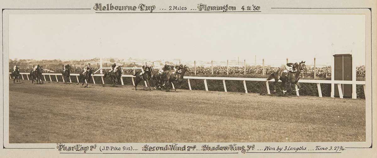 A black and white photo of Phar Lap winning the Melbourne Cup, 1930. - click to view larger image