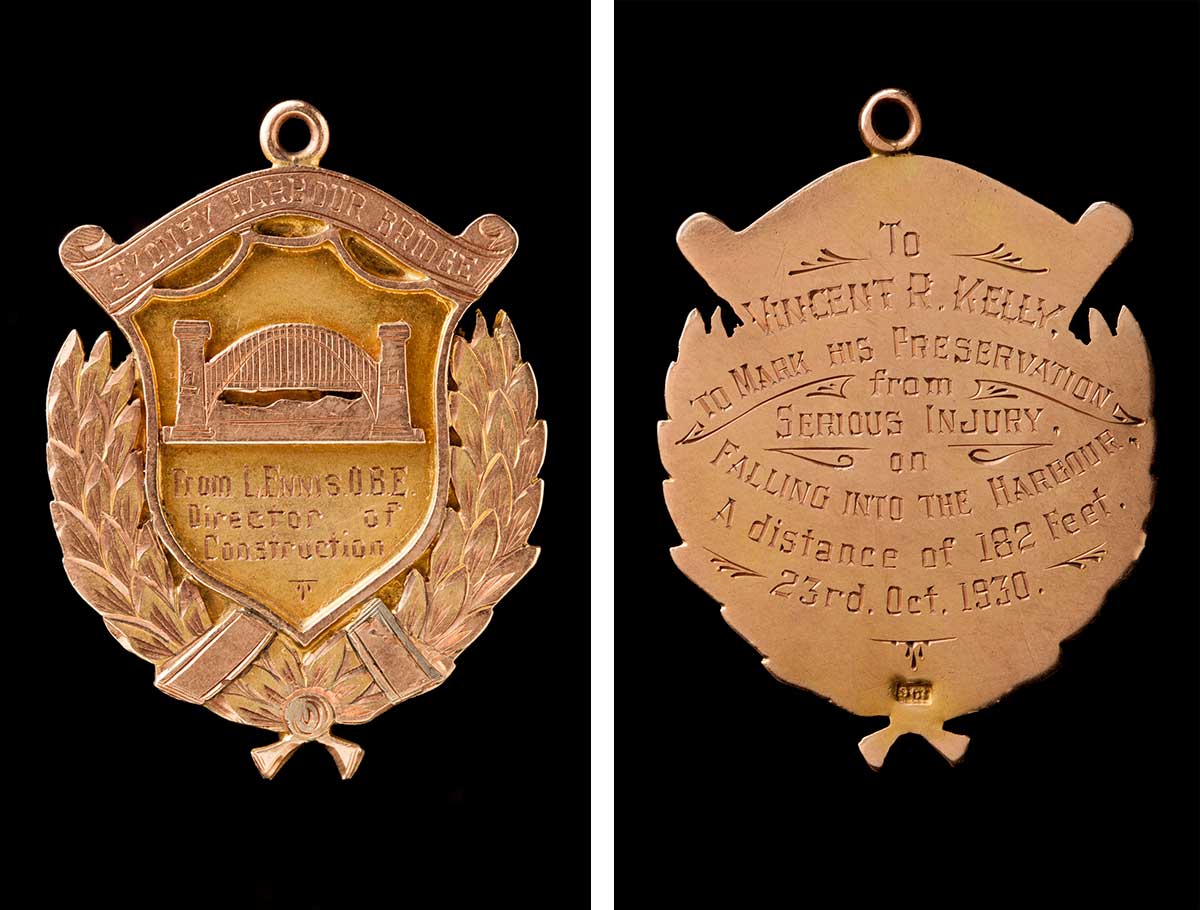 The front and back of a medal awarded to Vincent Kelly. The front has an image of the Sydney Harbour Bridge with an inscription that reads: 'From L. Ennis. O.B.E. Director of Construction'. The inscription on the back reads: 'To Vincent R. Kelly. To mark his preservation from serious injury on falling into the harbour. A distance of 182 feet. 23rd. Oct. 1930.'
