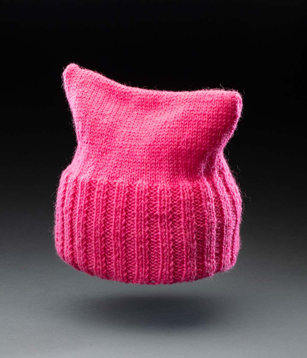 A bright pink, knitted beanie. - click to view larger image