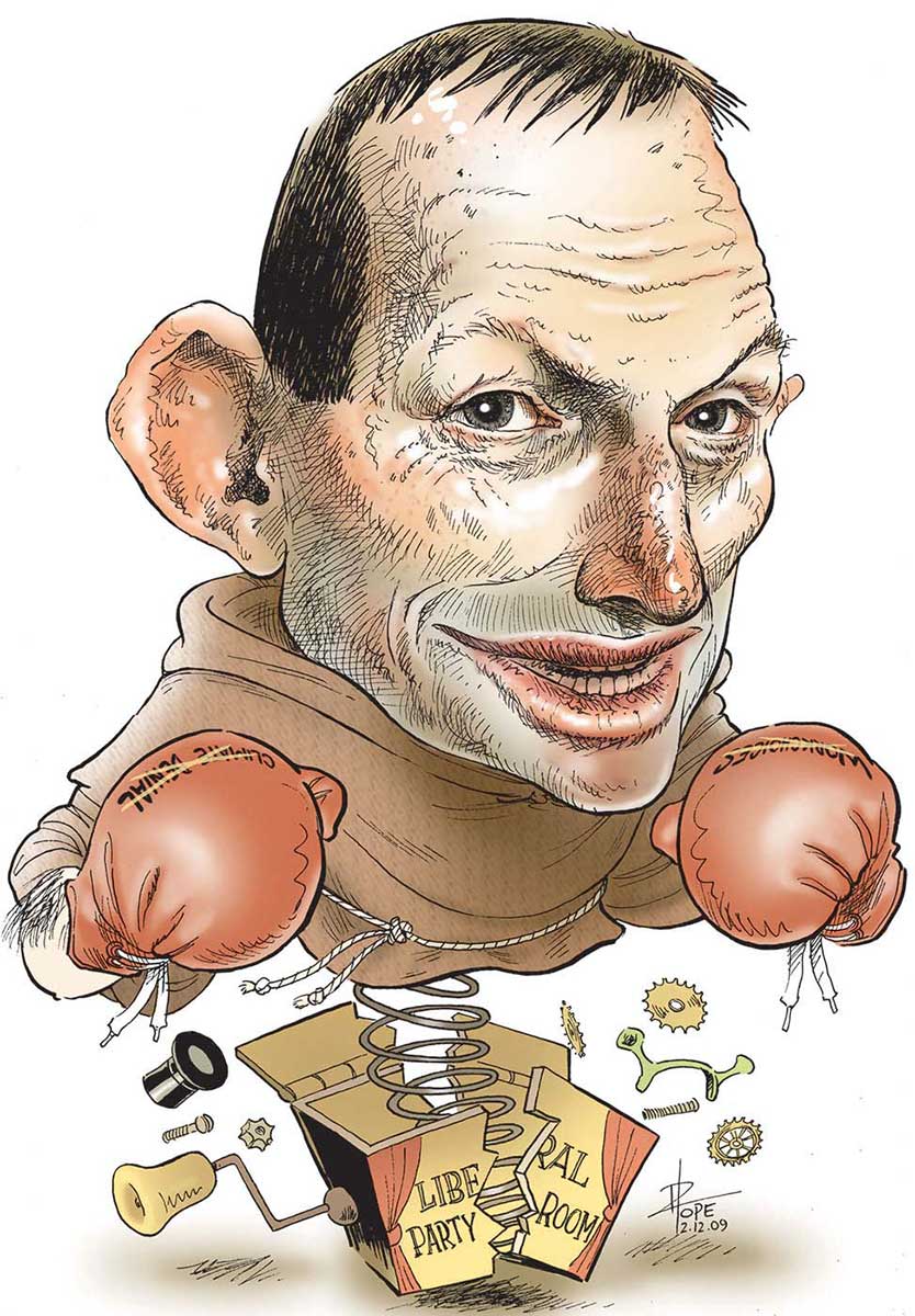 A colour drawing of Tony Abbott depicted as a jack-in-the-box. His upper body is dressed in a monk's robe with a rope tie around the waist and boxing gloves on both hands. Each glove has crossed out text: on the left-hand glove, 'Workchoices' and on the right-hand glove 'Climate Denial'. Instead of legs, there is a spring emerging from a broken box labeled 'Liberal Party Room'. The box is cracked in half with a variety of parts - springs, nuts, bolts and cogs flying about. - click to view larger image