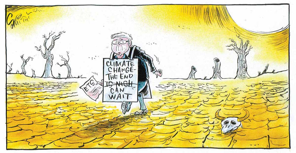 A colour cartoon depicting Kevin Rudd wandering through a hot desert landscape, with dead tree stumps in the background, and a cattle skull in the foreground. Mr Rudd carries a document headed 'ETS' and over his shoulders he wears a placard which says, 'Climate change – the end is nigh'. 'Is nigh' has been crossed out and replaced with 'can wait'. - click to view larger image