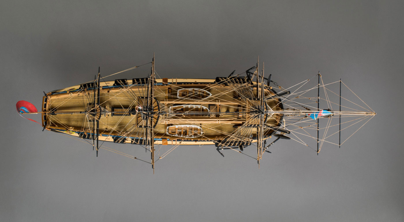 Image of a model wooden sailing ship, taken from above. - click to view larger image