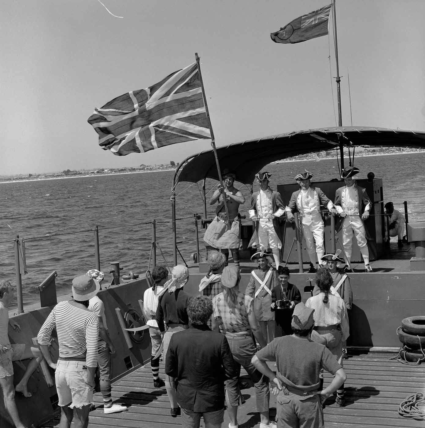 Black and white photo featuring people in a re-enactment of Captain Cook landing at Rockingham, March 1970 - click to view larger image